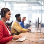a customer support representative using contact center software to communicate