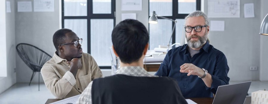 Business people sitting at director's office